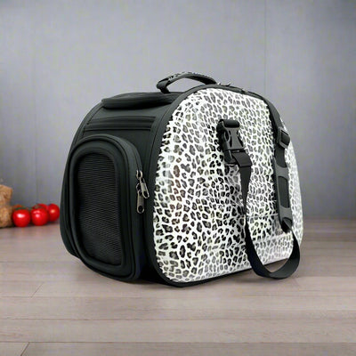 Classic Eva Carrier in Leopard print for transporting dogs and cats, features foldable design and ventilation slots.
