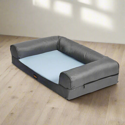 Summer cooling insect prevention dog bed sofa in grey with a blue sleeping surface for comfort and insect protection.