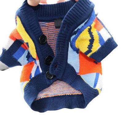 Colorful graffiti-inspired cardigan for stylish pets, featuring bright patterns and button closure.