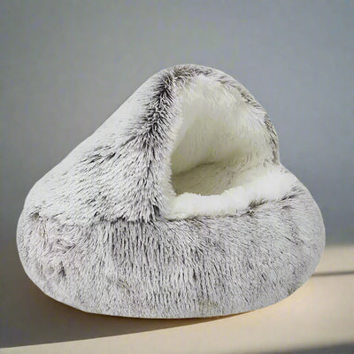 Cozy semi-closed pet bed for cats and small dogs in soft gray plush fabric.